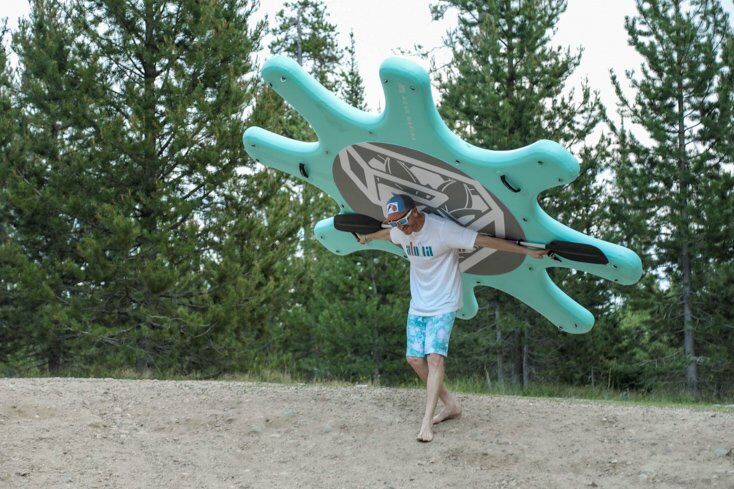 Carrying Large Yoga Dock to Water