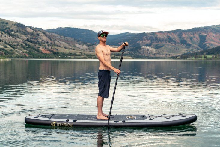 Man Paddling Paddle Board