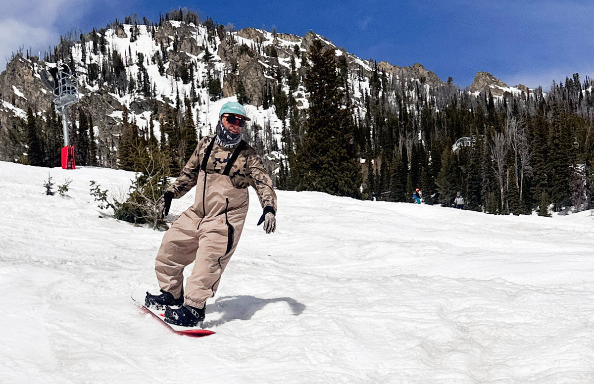 Man Making Snowboard Turn on Burton Process Snowboard Test