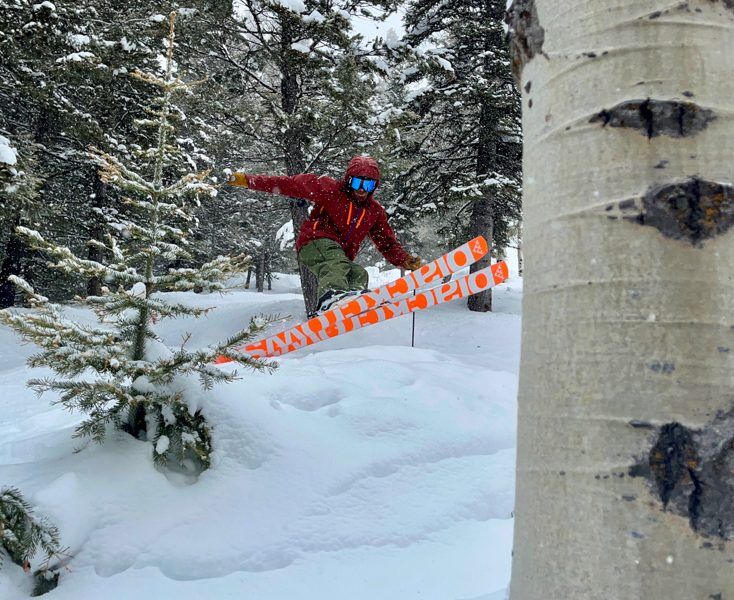 Skier on Black Crows Mirus Cor Skis