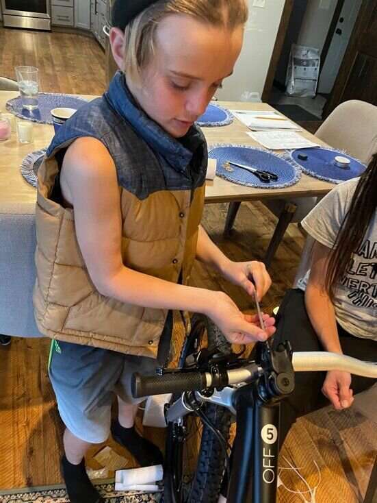 Boy Assembling MTB