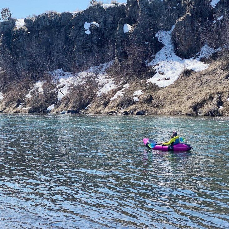 Man Paddling Expedition Raft