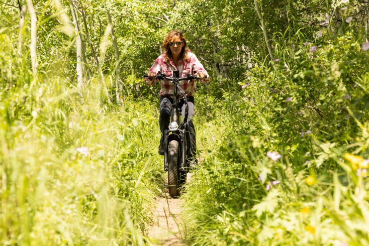 Women Riding E-Bike