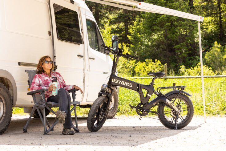 Women Sitting Next to Heybike Tyson E-Bike