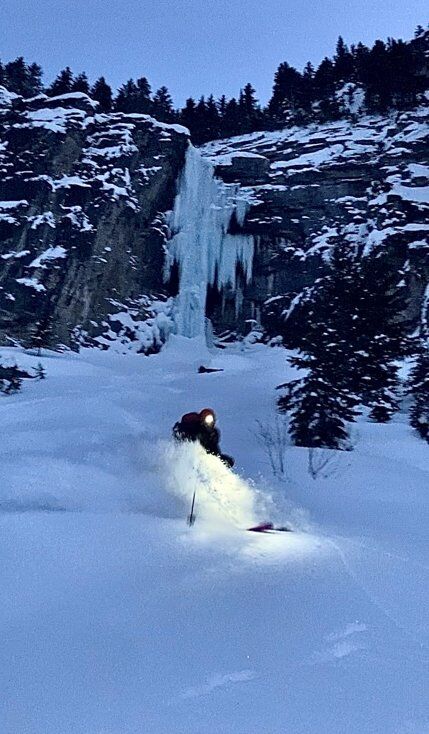 Man Skiing By Headlight