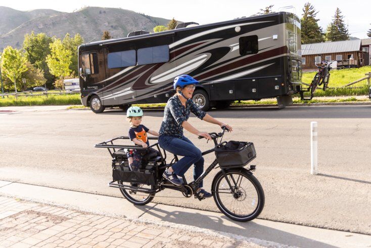 The Xtracycle Stoker E-Bike Riding on Street with Kid