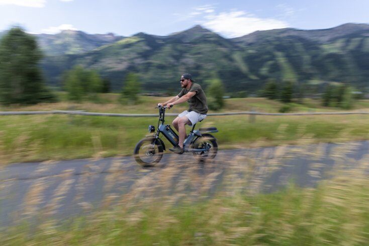 Man Riding E-Bike Fast
