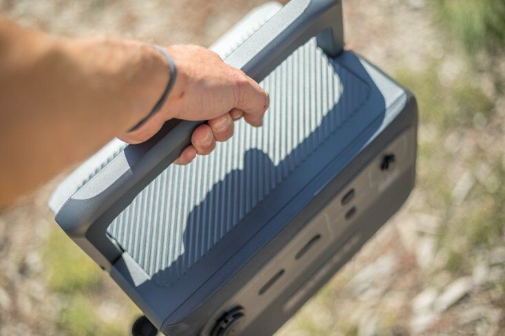 Man Carrying Portable Battery