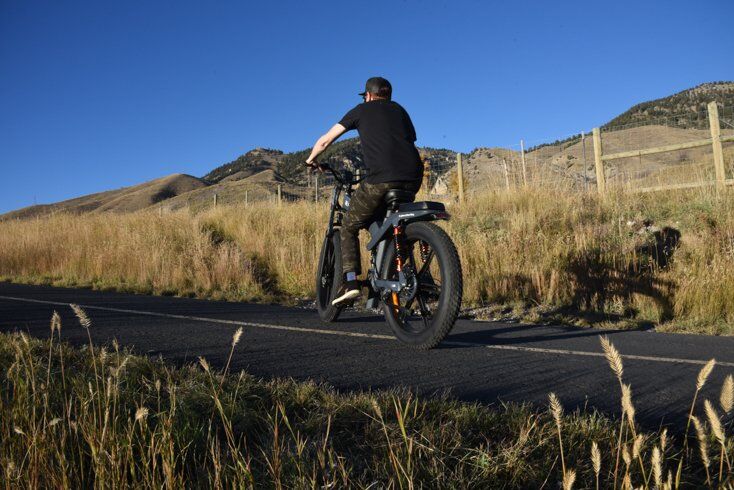 Man Sitting on E-Bike