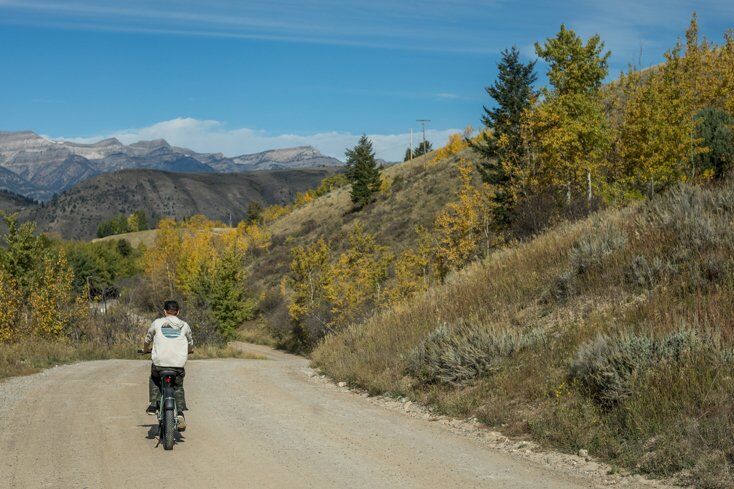 E-Bike Rider with Mountains in Background