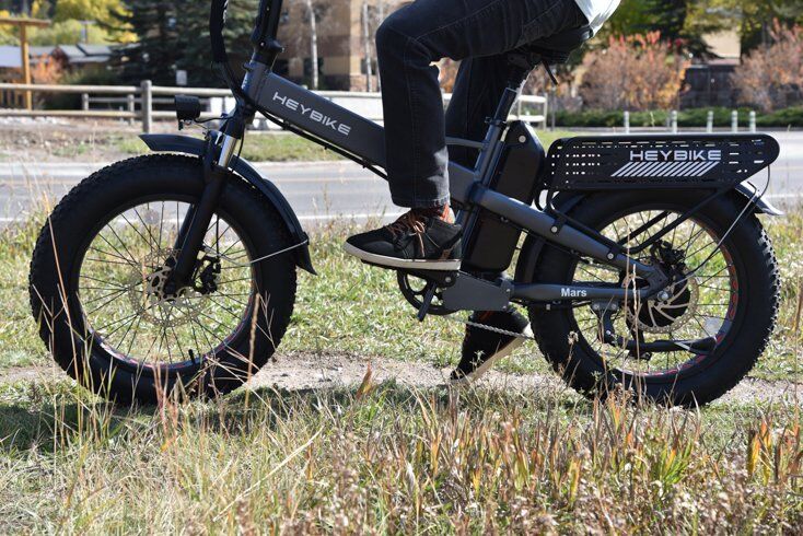 Man Sitting on E-Bike