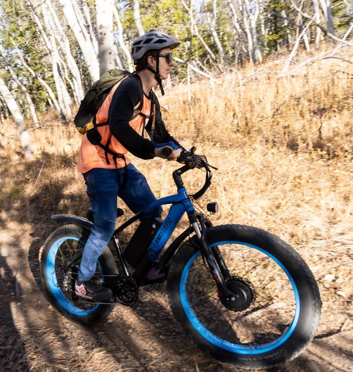 Man Riding E-Bike Uphill With Speed
