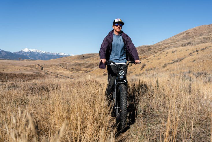 Man Riding E-Bike with Suspension