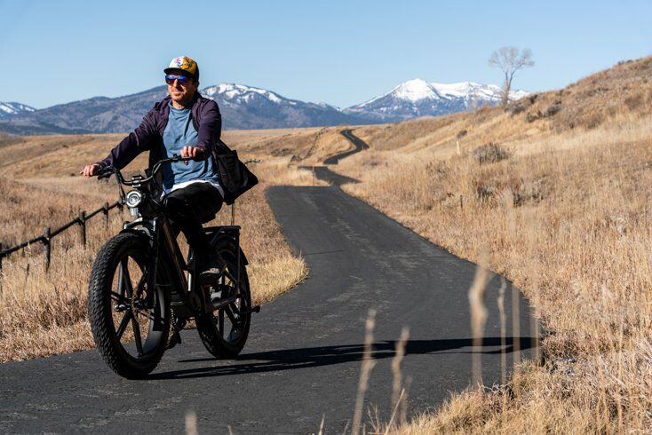 Man Having Fun Riding E-Bike