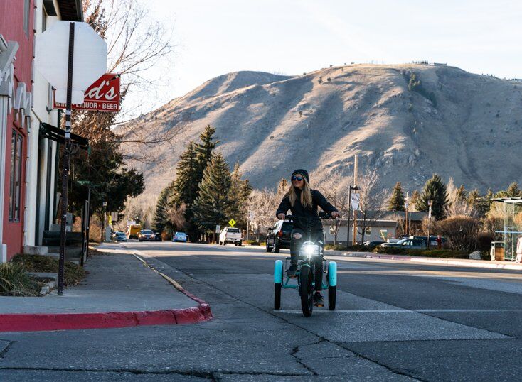 Women Riding Trike with Traffic