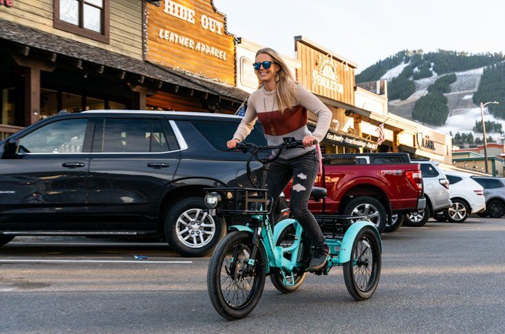 Women Riding Fast on Mooncool TK1 Trike