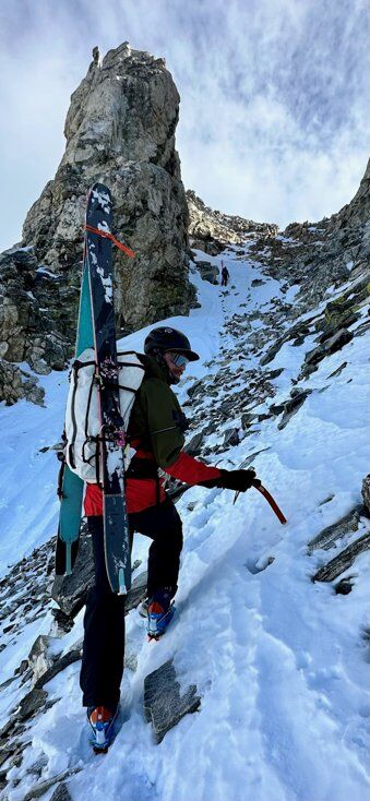 Man Hiking with Ski Boots