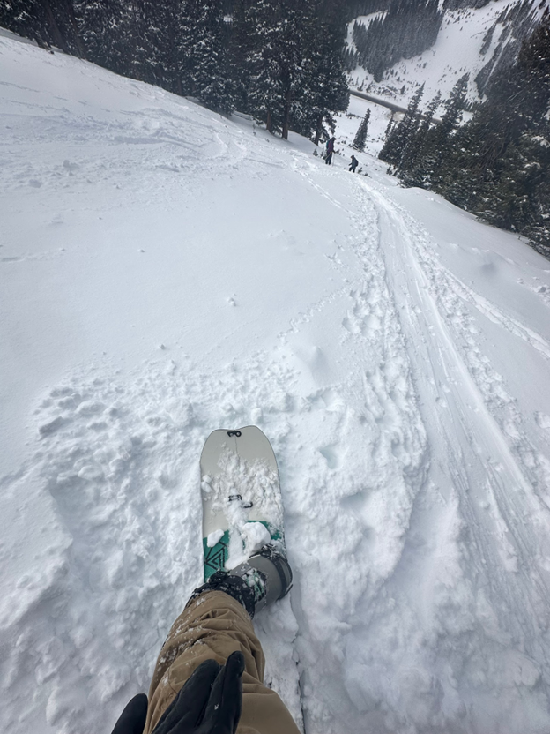 Man Snowboarding on Slash Vertical Splitboard