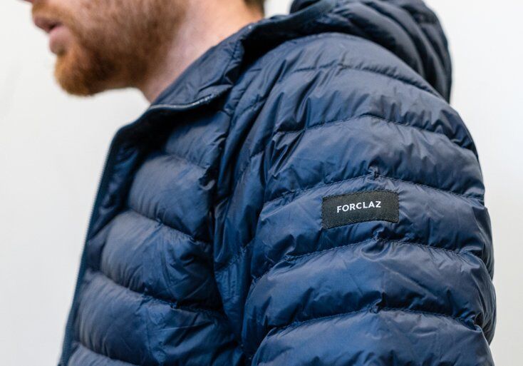 Man Wearing Puffer Jacket Indoors