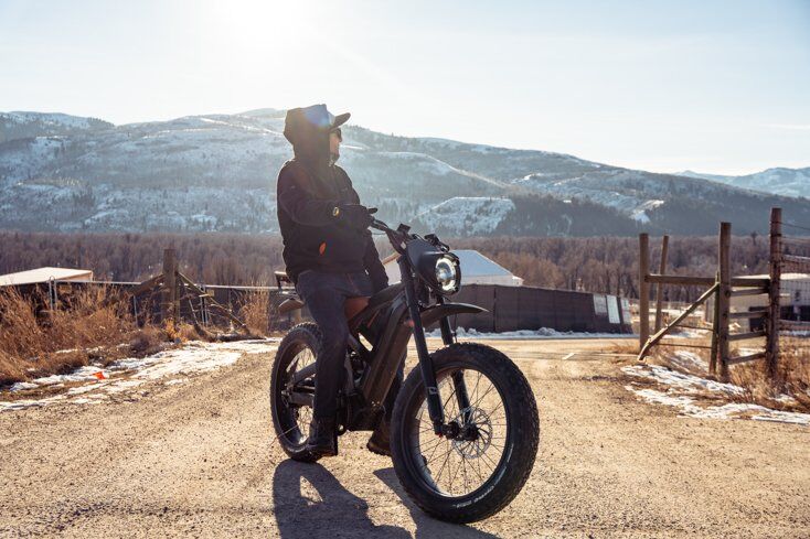 Man Sitting on E-Bike