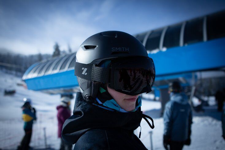Women Wearing Ski Goggles Next to Chairlift
