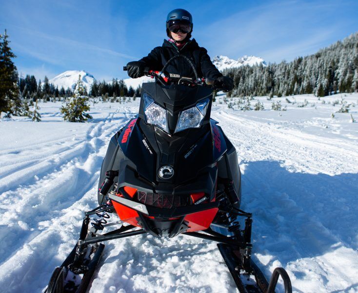 Zeal Highmark Goggle Review Women Wearing Snowmobile Googles on Bluebird Day
