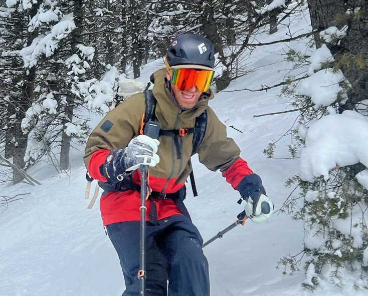 Man Skiing in White Hestra Gloves