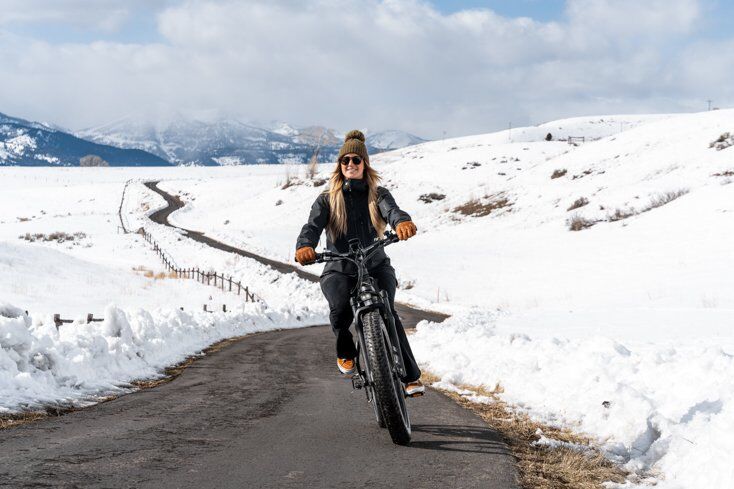 Women Riding E-Bike on Bike Path