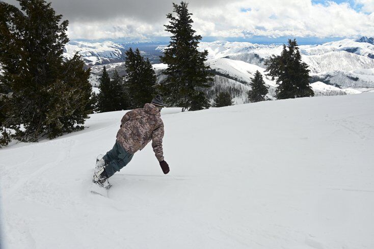 Man Snowboarding at Sun Valley Resort