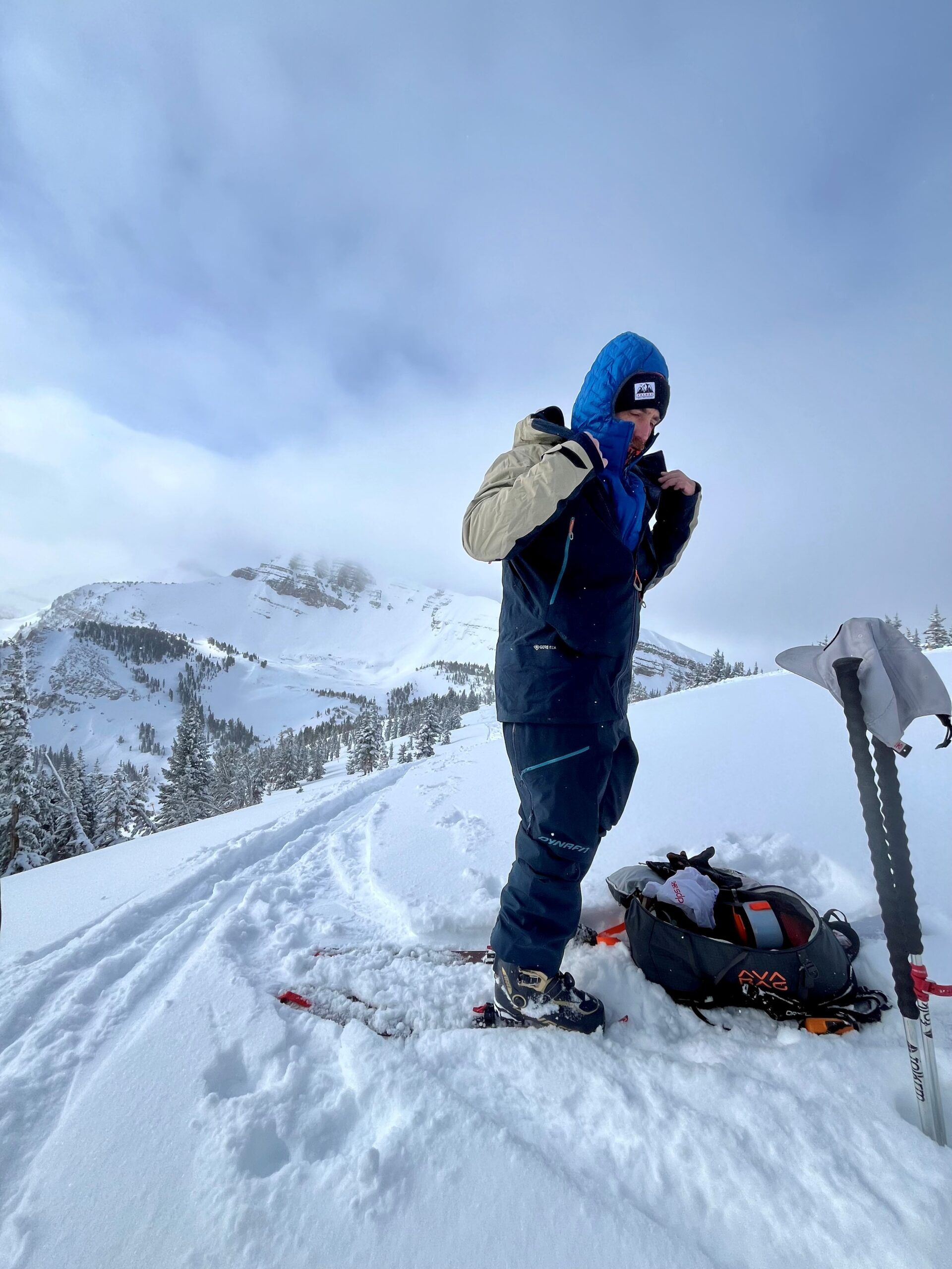 Man Putting on the Patagonia Down Jacket