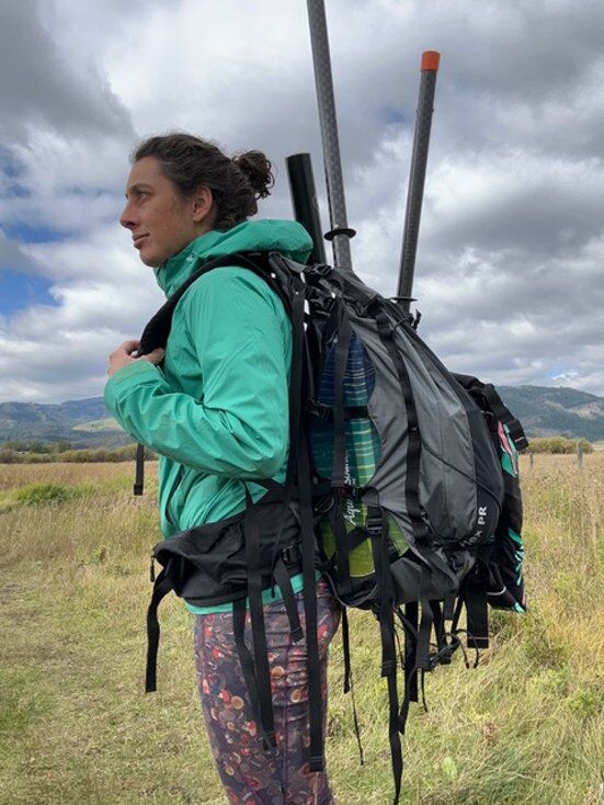 Mallory Wearing Pakrafting Backpack