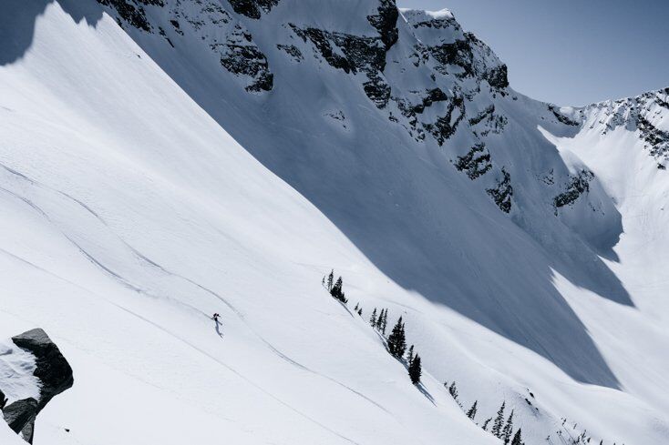 Women Skiing Big Mountain Powder