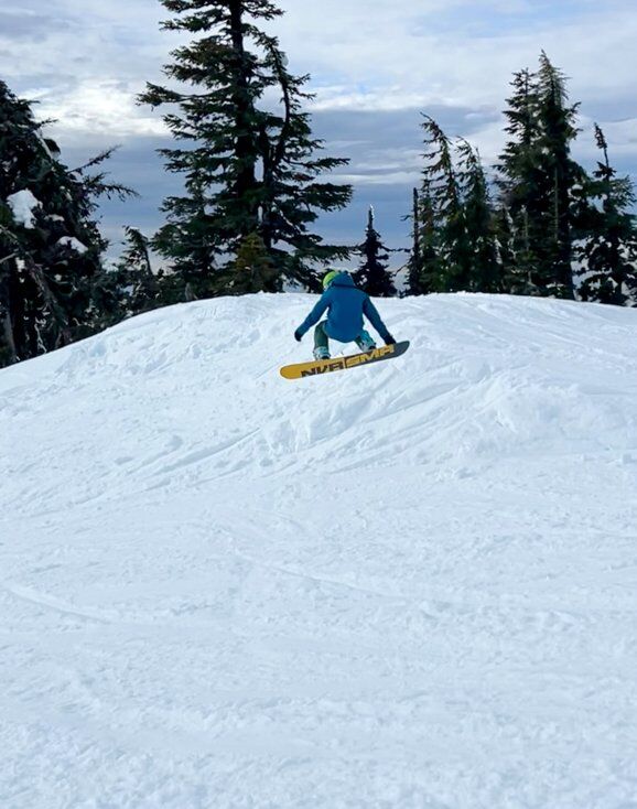 Man Snowboarding Wearing 686 Jacket in Japan