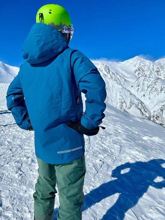 Man Wearing Blue Snowboard Jacket