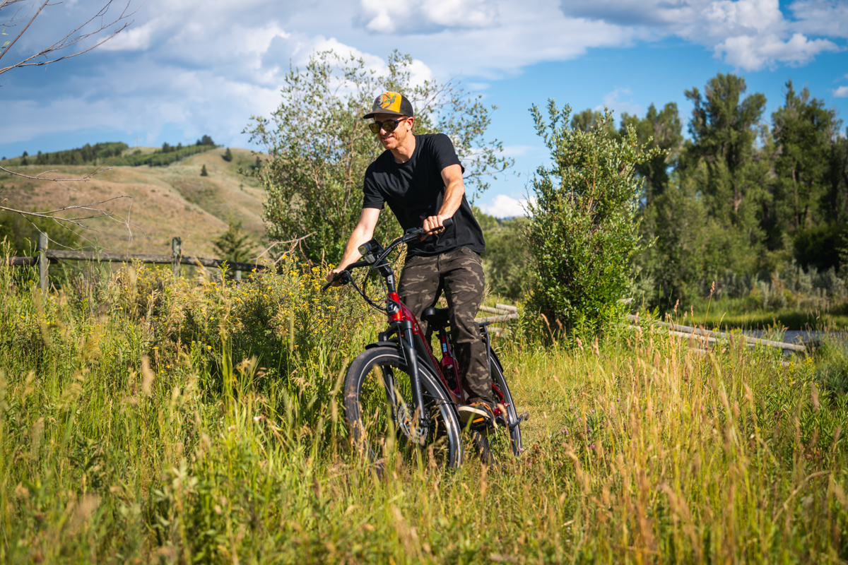 Man Riding E-Bike Fast on Trails