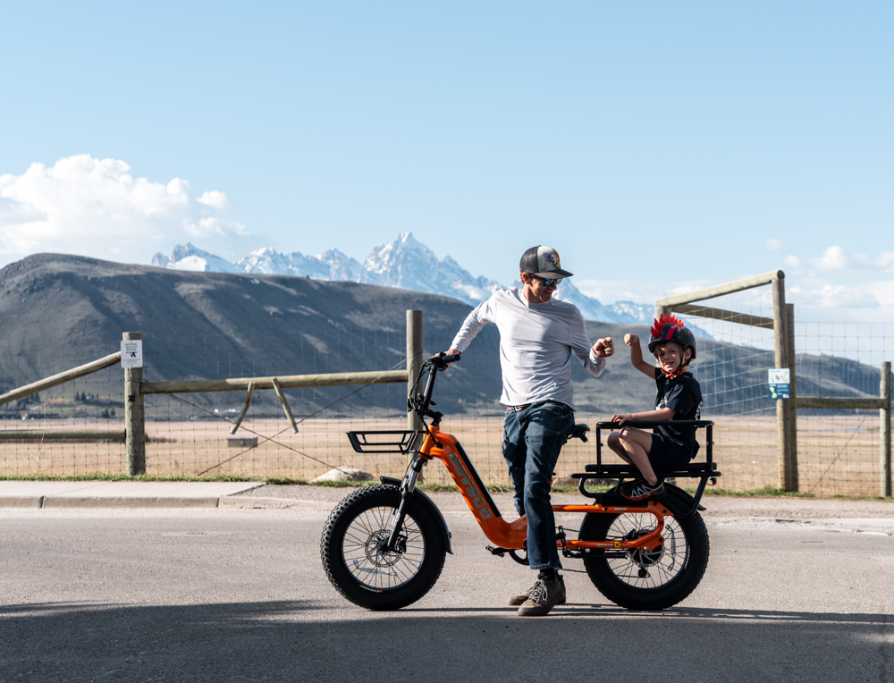 Man with Child on E-Bike