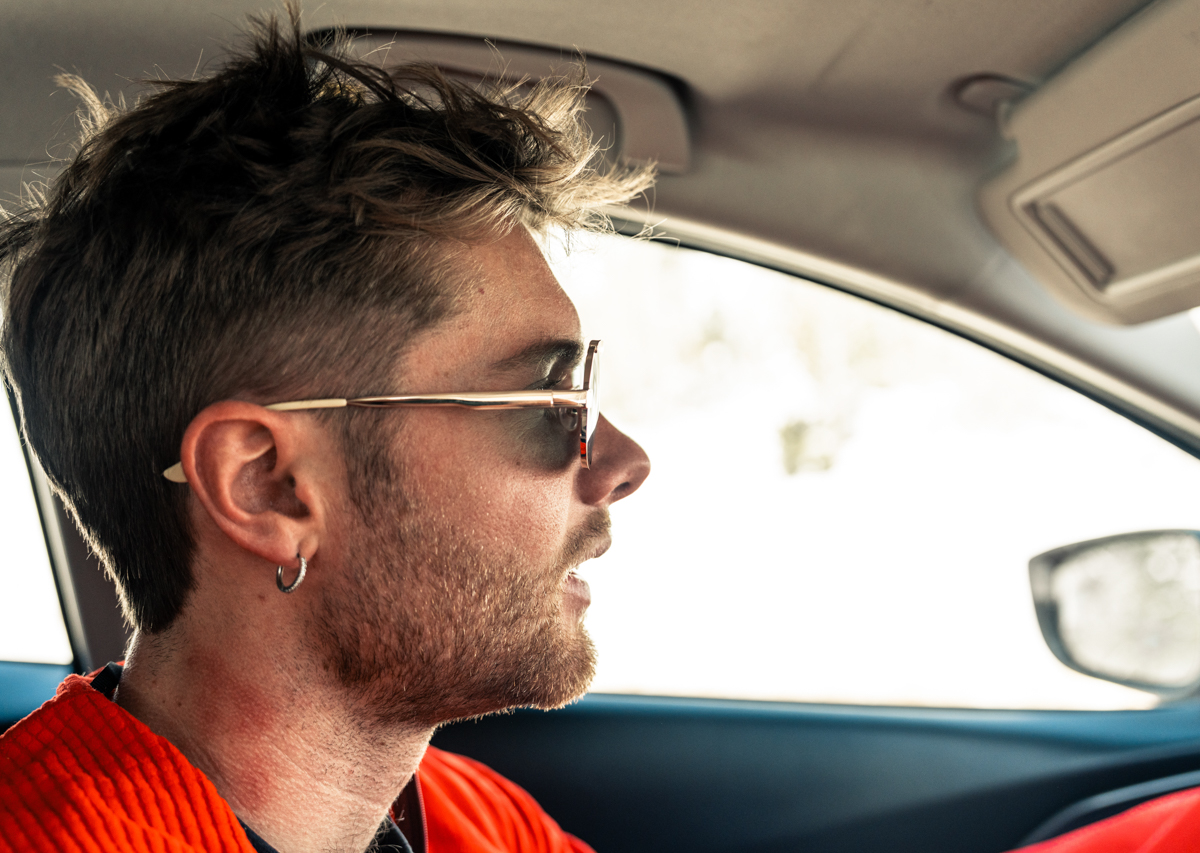 Man Wearing Readers while Driving