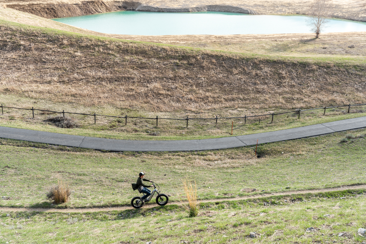 Man Riding E-Bike on Bike Paths