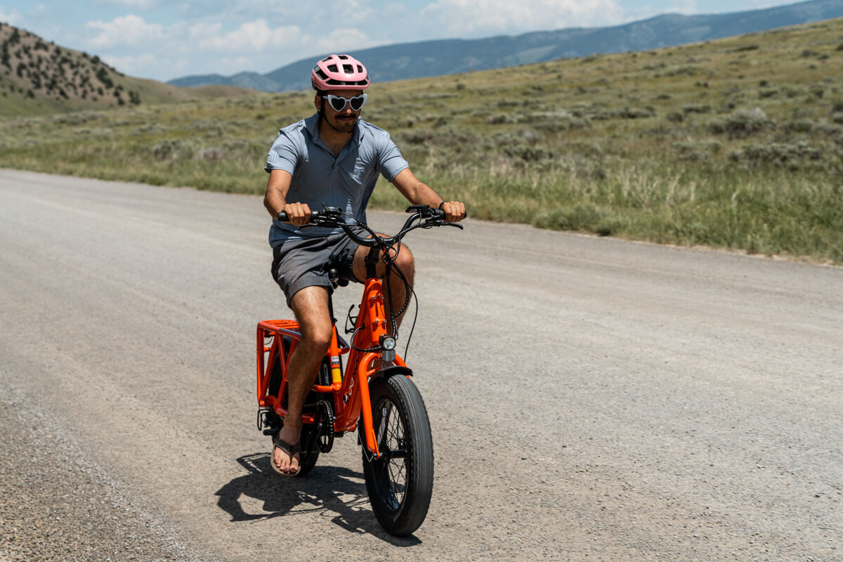 Man Riding E-Bike with Sandlas