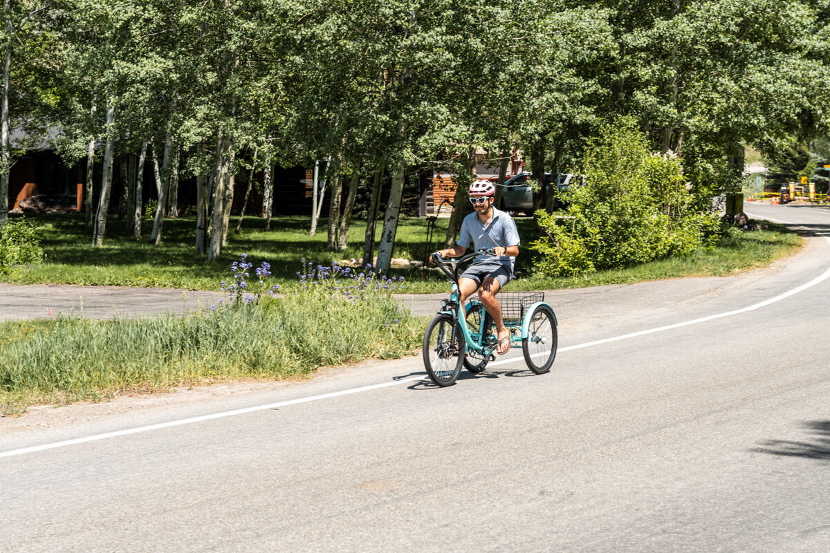 Man Riding E-Bike on Street