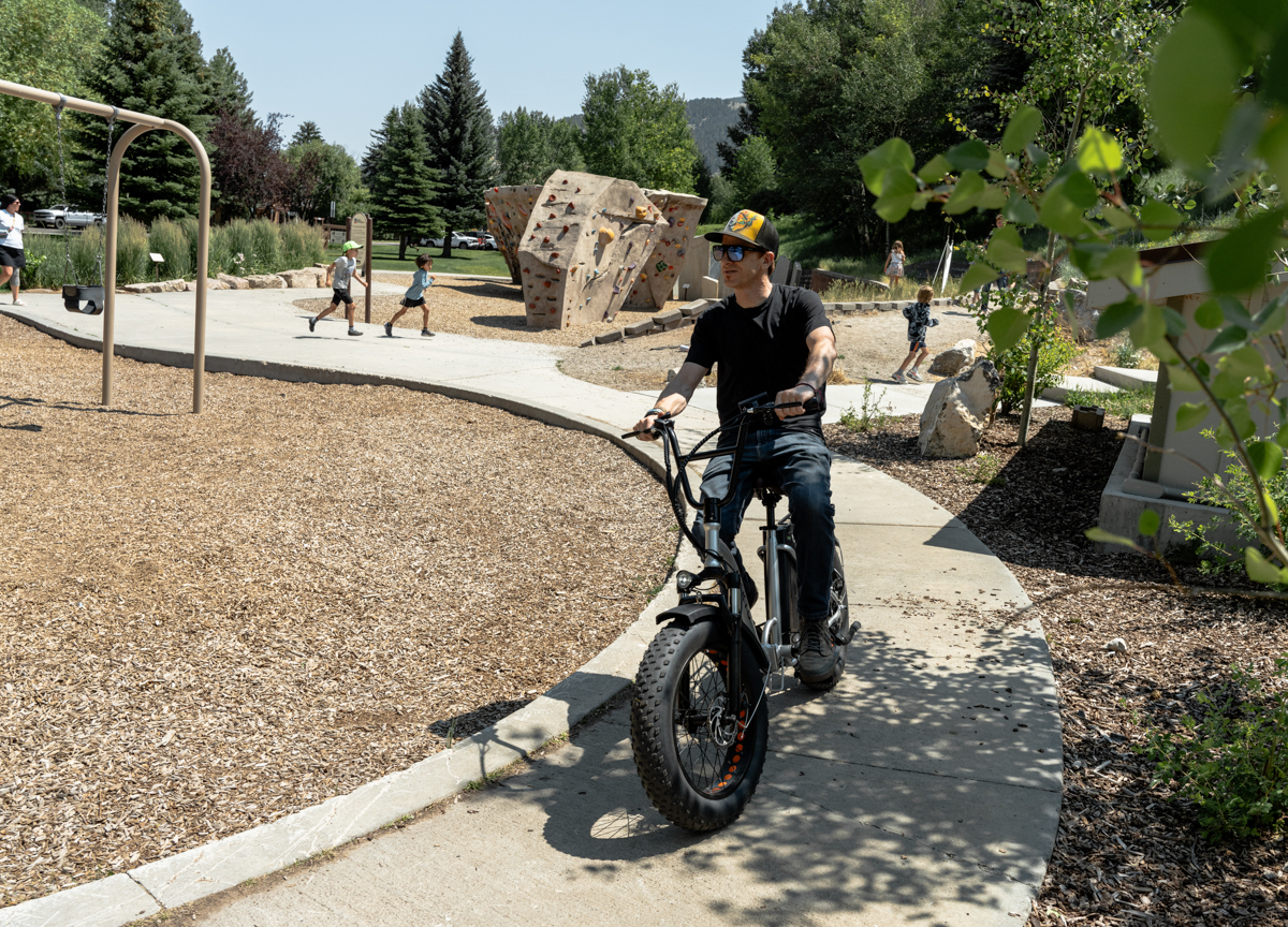 Man Riding E-Bike in Playground