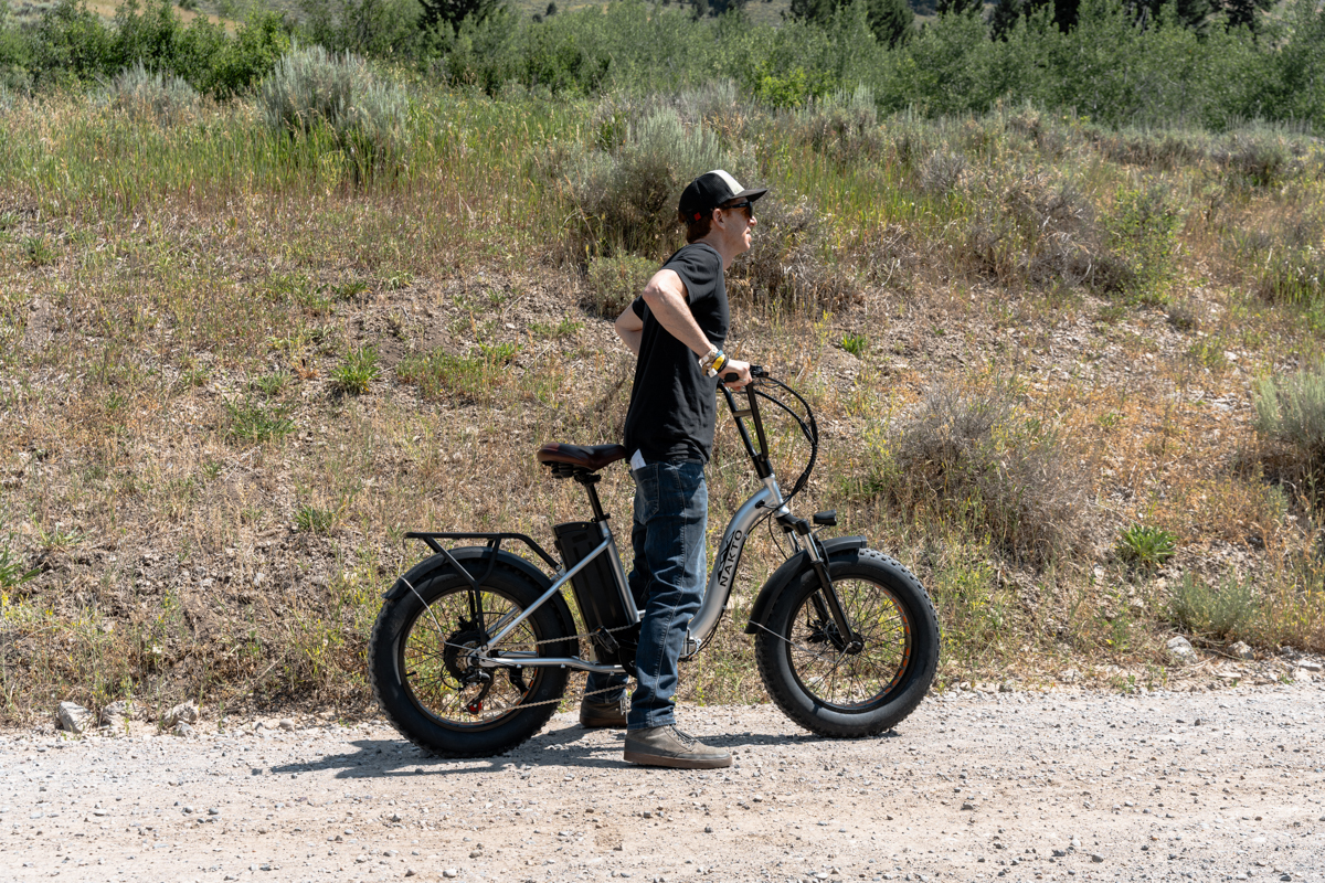 Man Standing Through E-Bike
