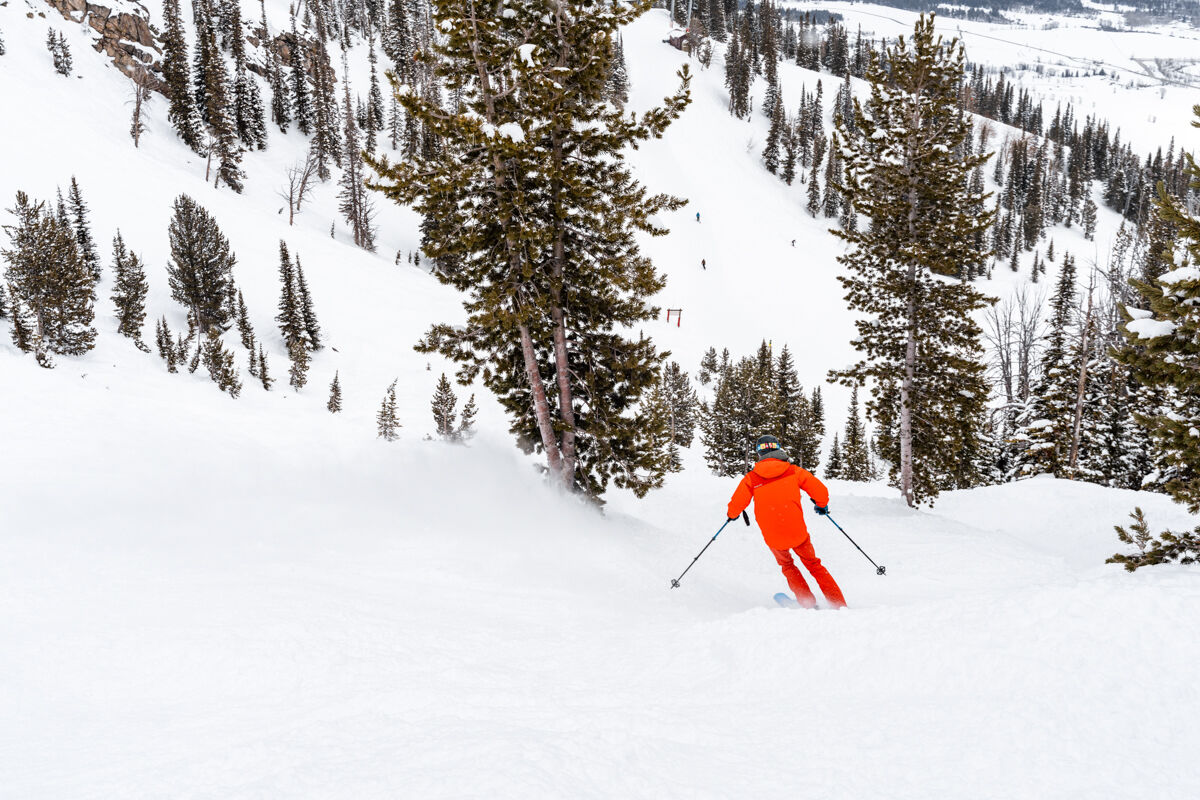 Man Skiing into a Chute