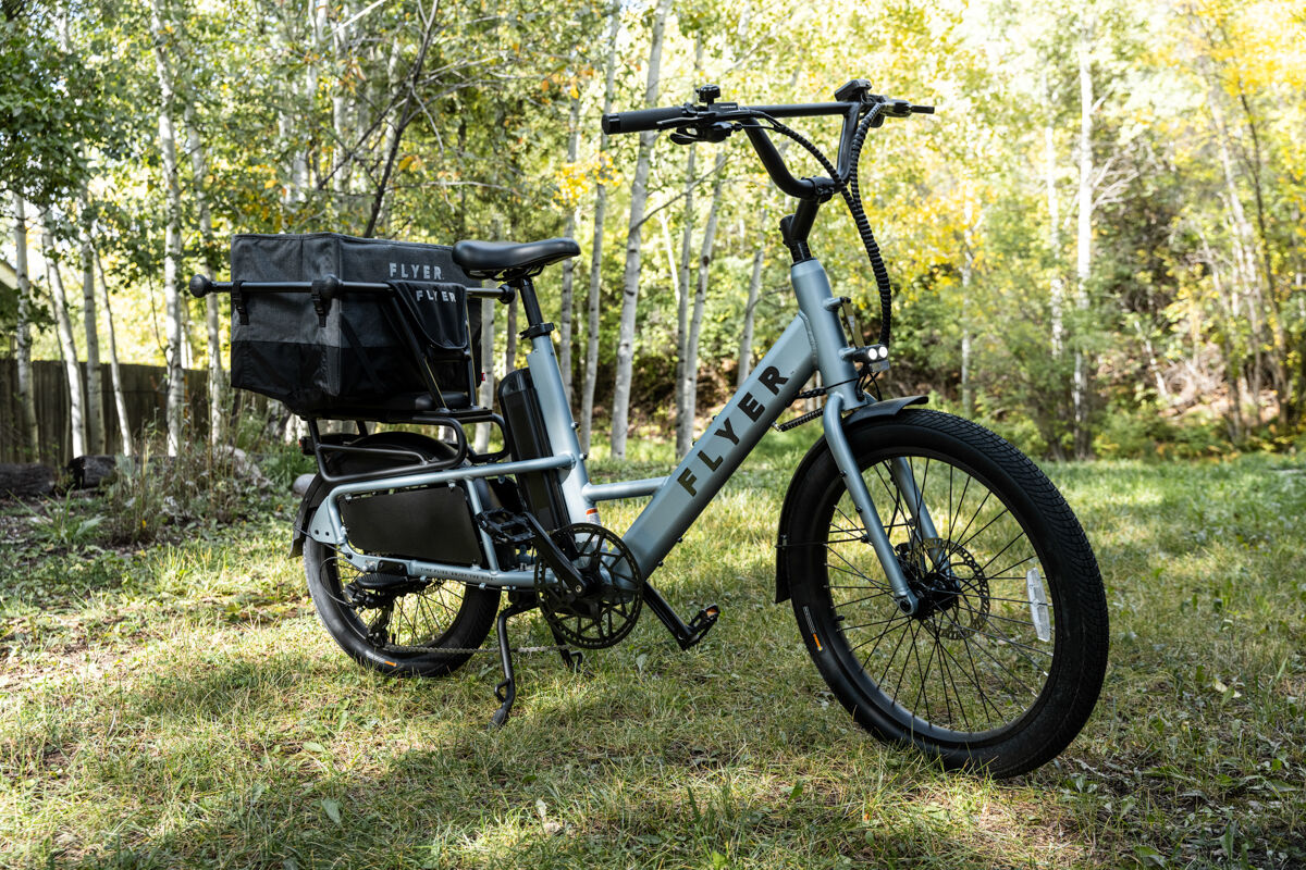 Flyer E-Bike Next to Stand of Aspens