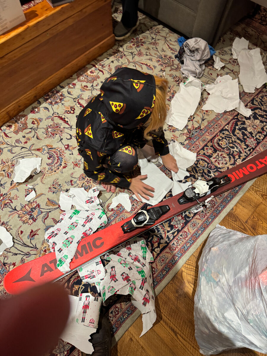 Boy Opening Christmas Ski Gear