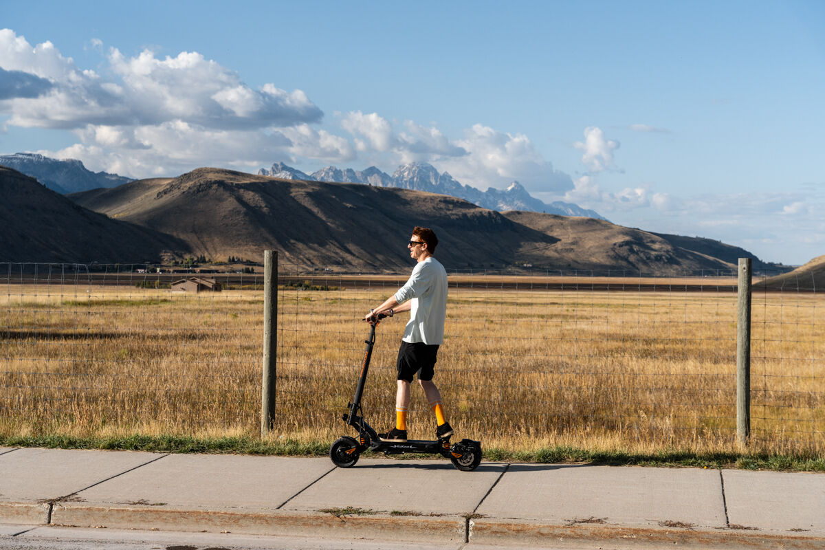 Man Commuting on E-Scooter in the Tetons