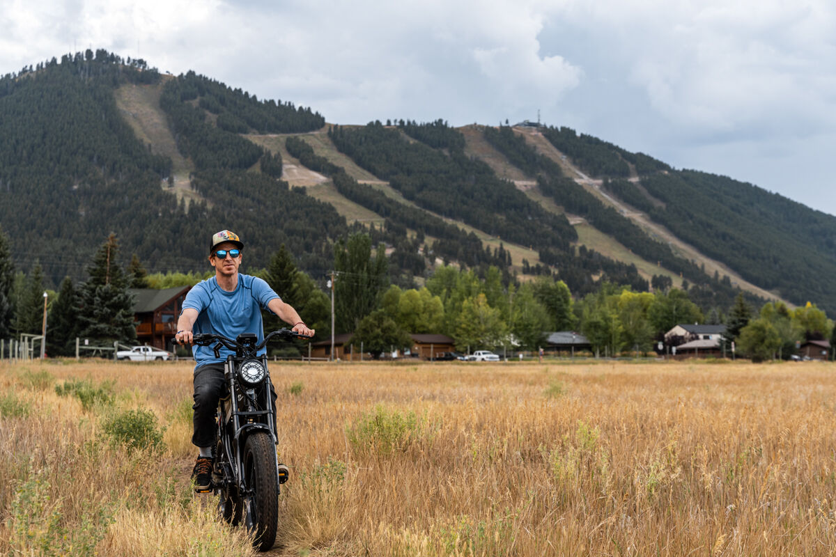 Man Riding E-Bike on Dirt Trails