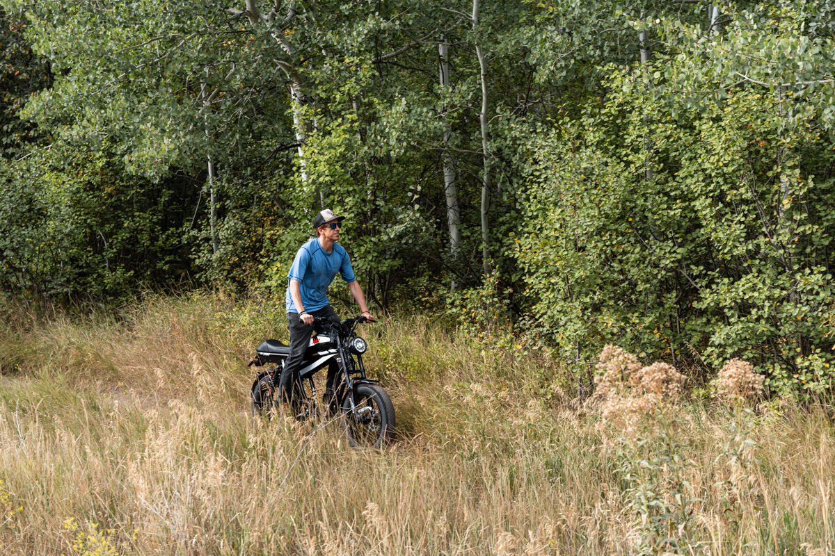 Man Riding E-Bike on Trails