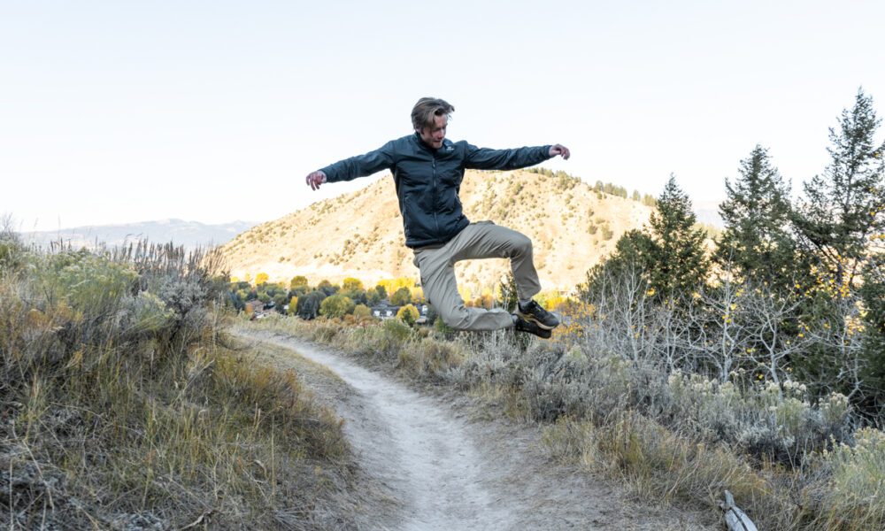 66 North Reykjavik Trousers Review Man Jumping Wearing 66 North Pants