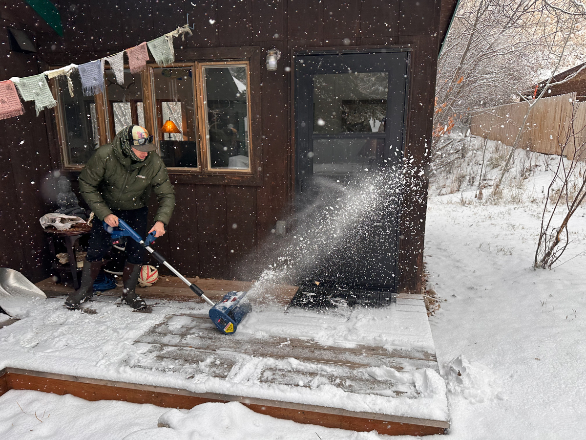 Clearing Deck in Winter with Snow Flying
